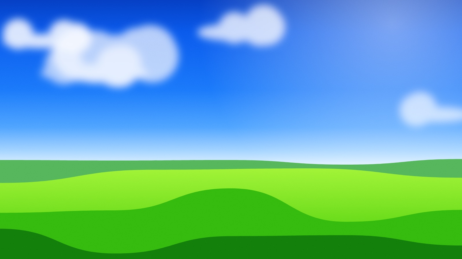 A clear midday sky with a few soft clouds over bright green fields rolling to the horizon.